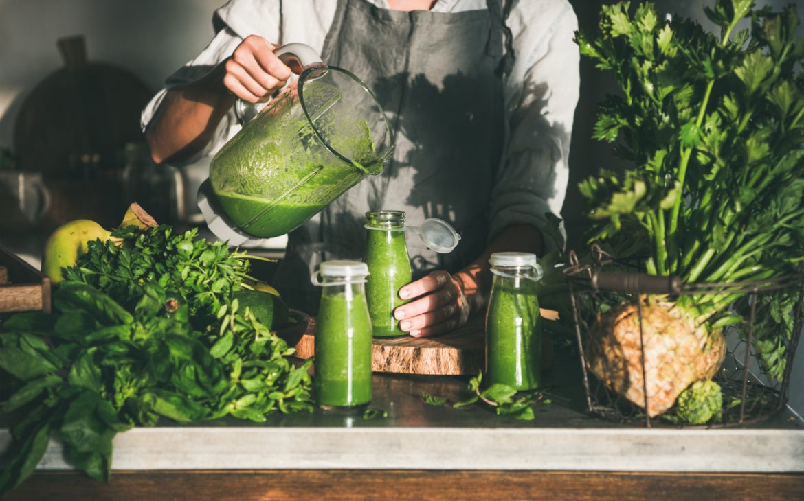 A fresh green smoothie made with herbs
